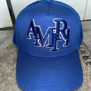 AMIRI Bright Blue Mesh Trucker Cap with Black Leather Logo Patch